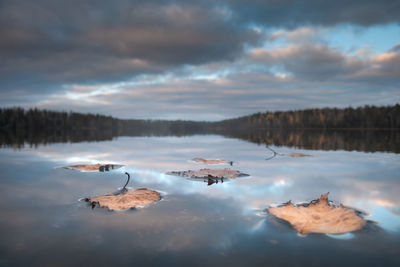 View of lake against cloudy sky