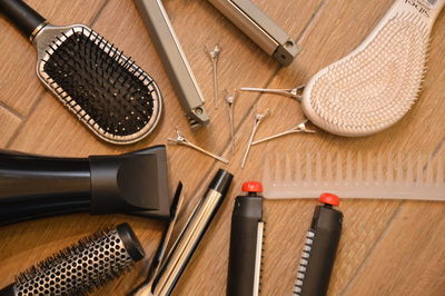 Close-up of hairdressing equipment on table