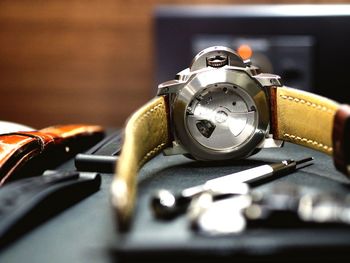 Close-up of clock on table