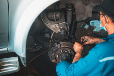 Man working on car