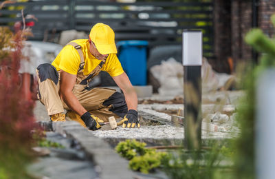 Mature man working on construction site