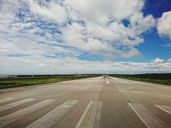 Empty road against sky