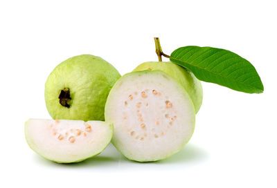 Close-up of fruits against white background