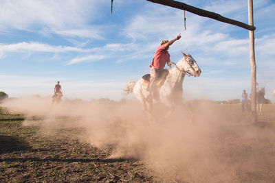 People in horse race