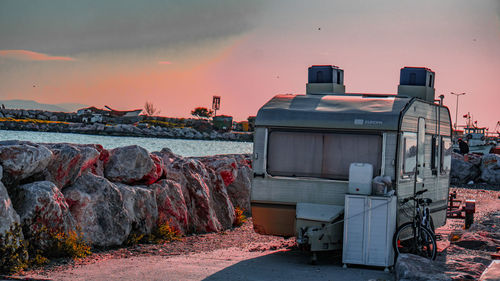 Panoramic view of sea against sky at sunset