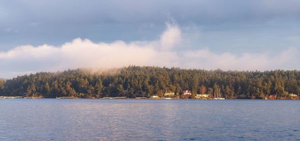 Scenic view of sea against sky during autumn