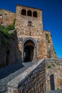 Low angle view of historic building against sky