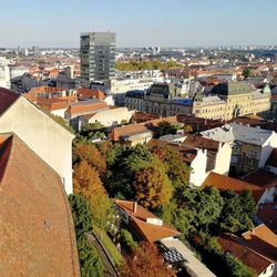 High angle view of buildings in city against sky