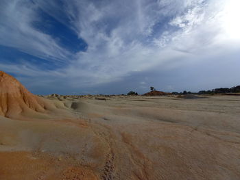 Scenic view of desert against sky