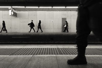 People at railroad station