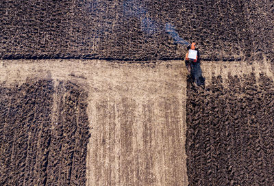 Aerial view of machinery on agricultural field