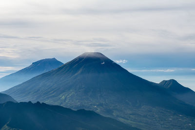 The view of lined mountains from the top of mount prau is very beautiful in the morning