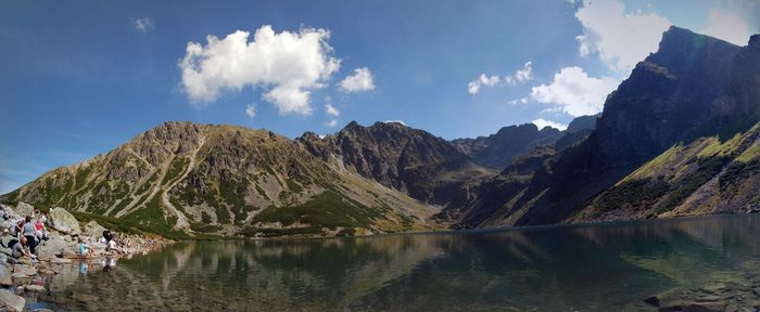 Panoramic view of lake and mountains against sky