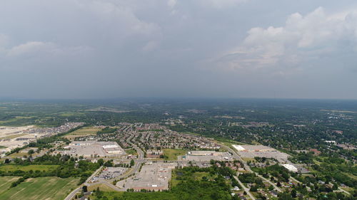 High angle view of buildings in city against sky