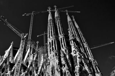Low angle view of illuminated building at night