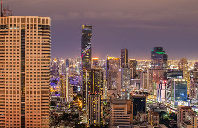 The cityscape, the skyscrapers and the buildings of bangkok thailand southeast asia in the night 