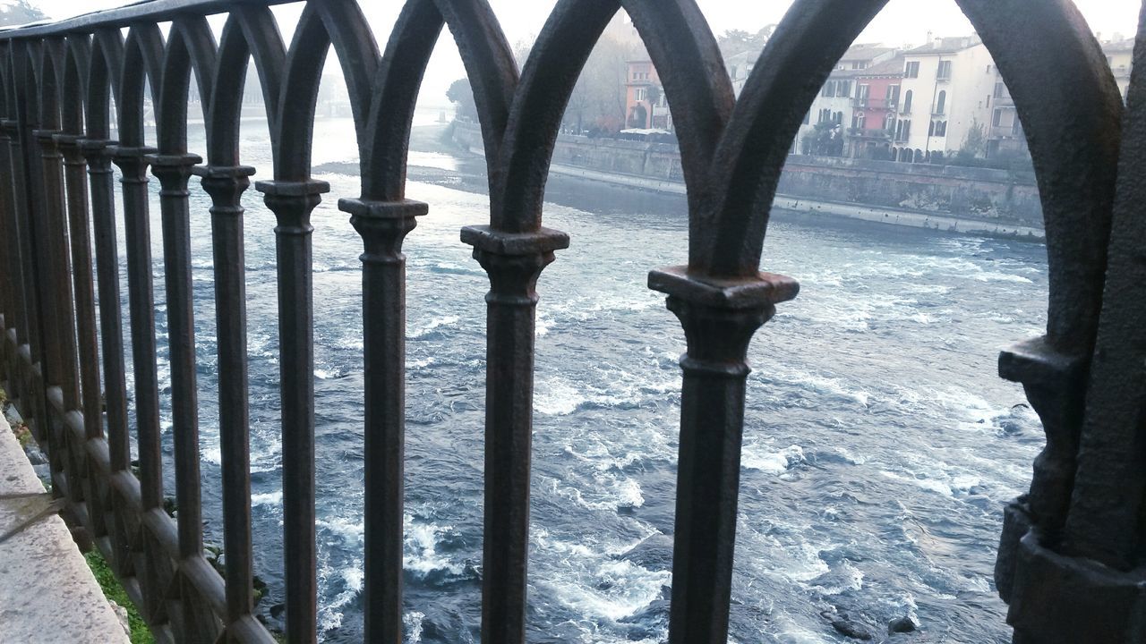 architecture, built structure, water, architectural column, bridge - man made structure, connection, metal, railing, river, support, arch, in a row, day, column, no people, engineering, outdoors, bridge, history, metallic