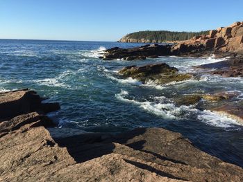 Scenic view of sea against clear sky