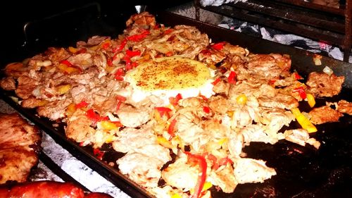 Close-up of meat on barbecue grill