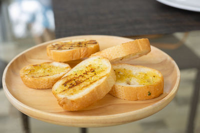 High angle view of bread in plate on table