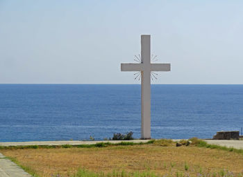 Big cross with athos sea in the background