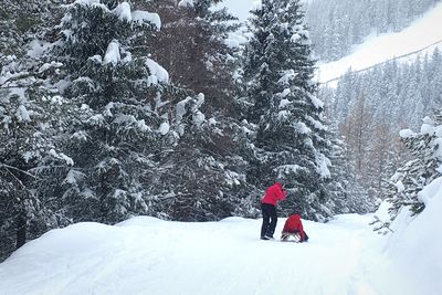 Full length of person on snow covered mountain