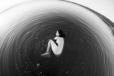 Close-up of woman swimming in water