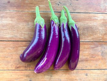 High angle view of purple candies on table