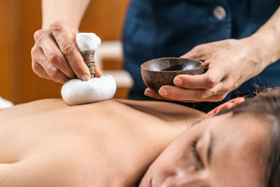 Kizhi ayurveda massage with herbal pads. 