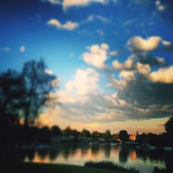 Scenic view of lake at sunset