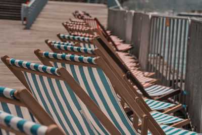 High angle view of chairs in row