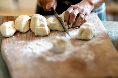 Man preparing food on table