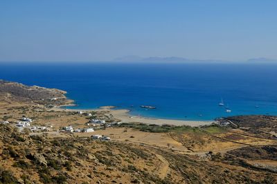 High angle view of sea against blue sky