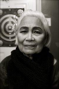 Close-up portrait of a smiling young woman
