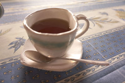 Close-up of coffee cup on table