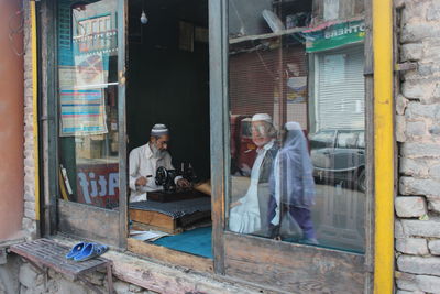 People working at store