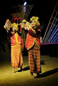 Group of people in traditional clothing during festival