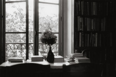 Flower vase on table at home