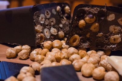 Close-up of chocolate bars with nuts on table