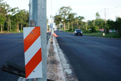 Road sign on street in city