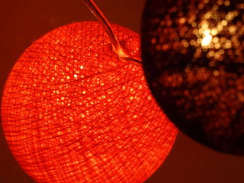 Close-up of illuminated electric lamp