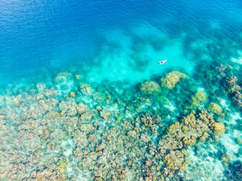 High angle view of blue sea