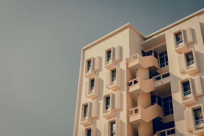 Low angle view of residential building against sky