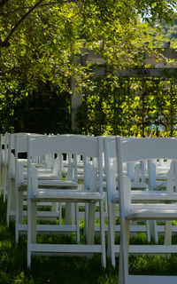 Empty chairs in cemetery