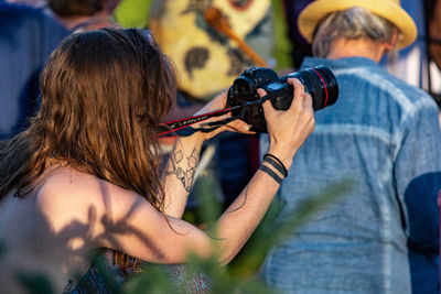 Midsection of woman playing outdoors