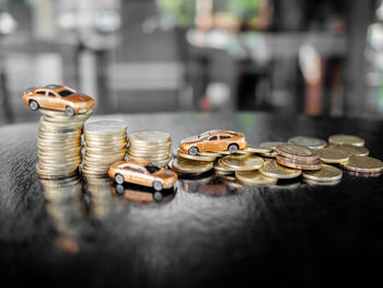 Close-up of coins on table