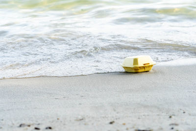 High angle view of toy car on beach