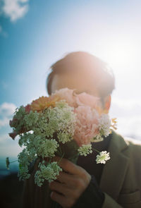 Close-up of flowers against the sky