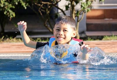 Boy playing in water