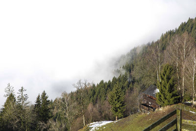 Scenic view of landscape against cloudy sky